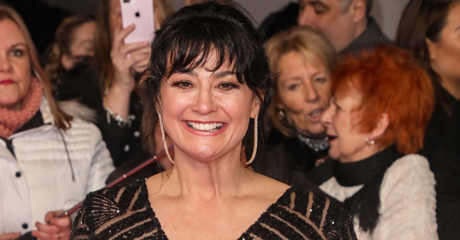 Emmerdale's Natalie J Robb is smiling on the red carpet