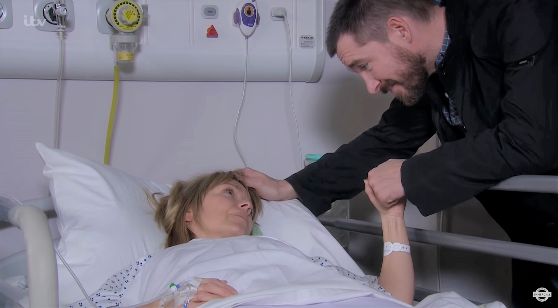 Emmerdale: Rhona in hospital aftter her hysterectomy as Pete strokes her face