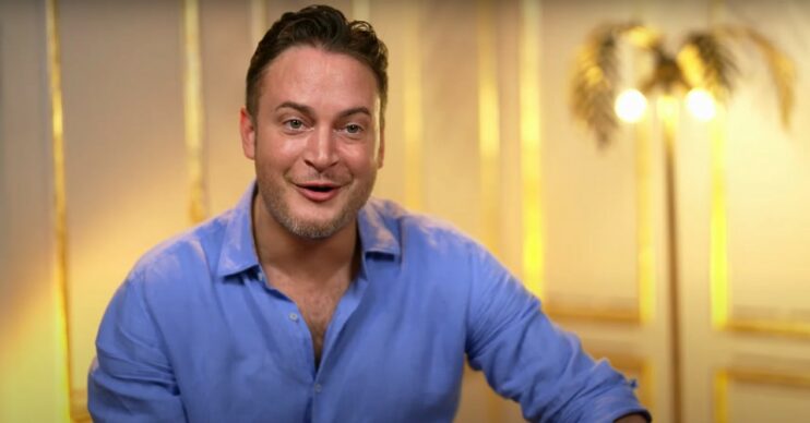 Gary Lucy wearing a blue shirt in Celebs Go Dating
