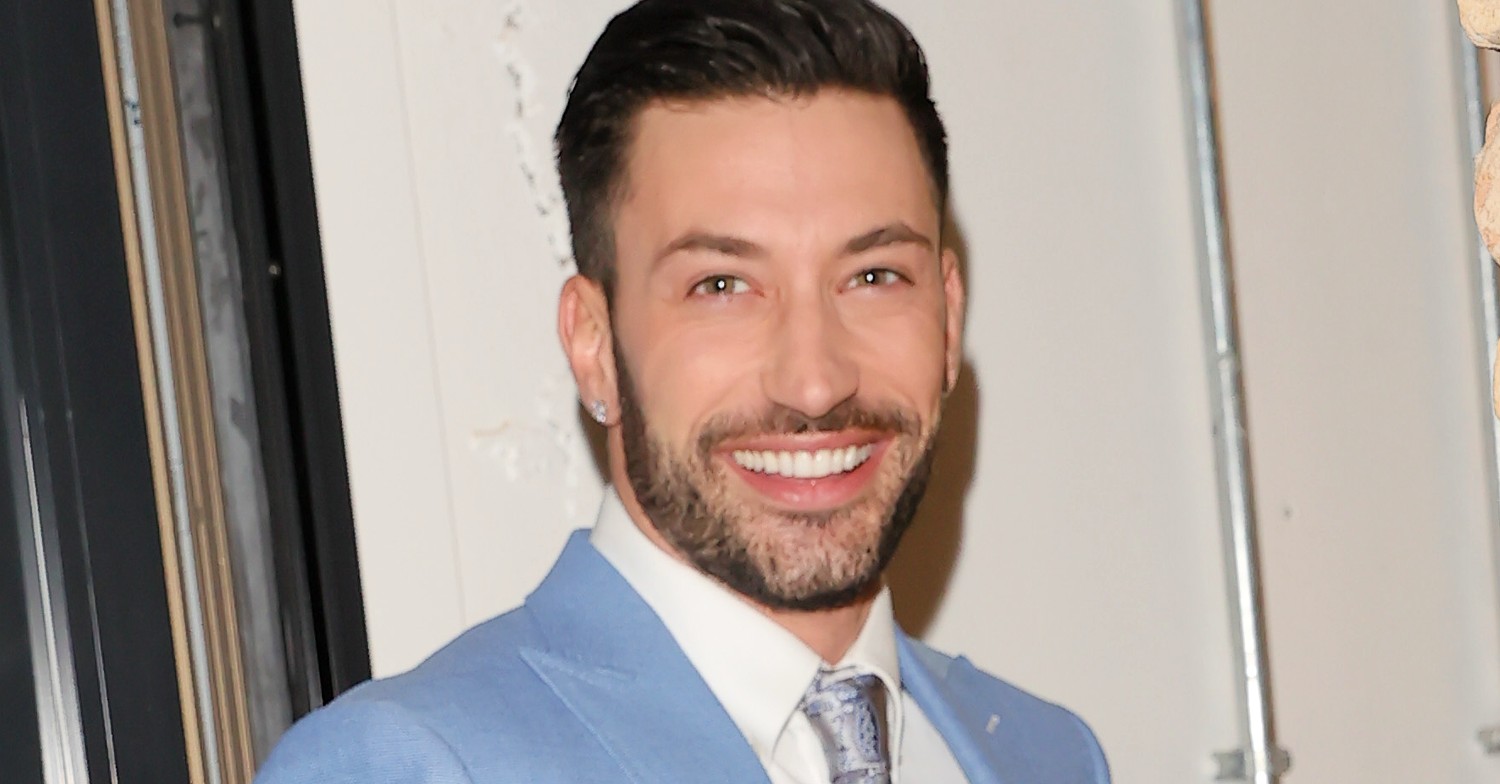 Strictly Come Dancing Giovanni Pernice wearing a blue suit and smiling