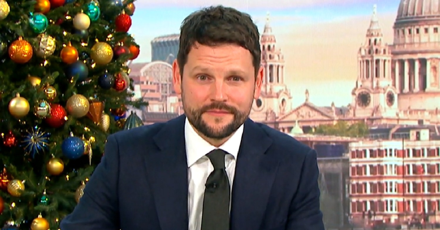 Gordon Smart hosting GMB with Christmas tree behind him