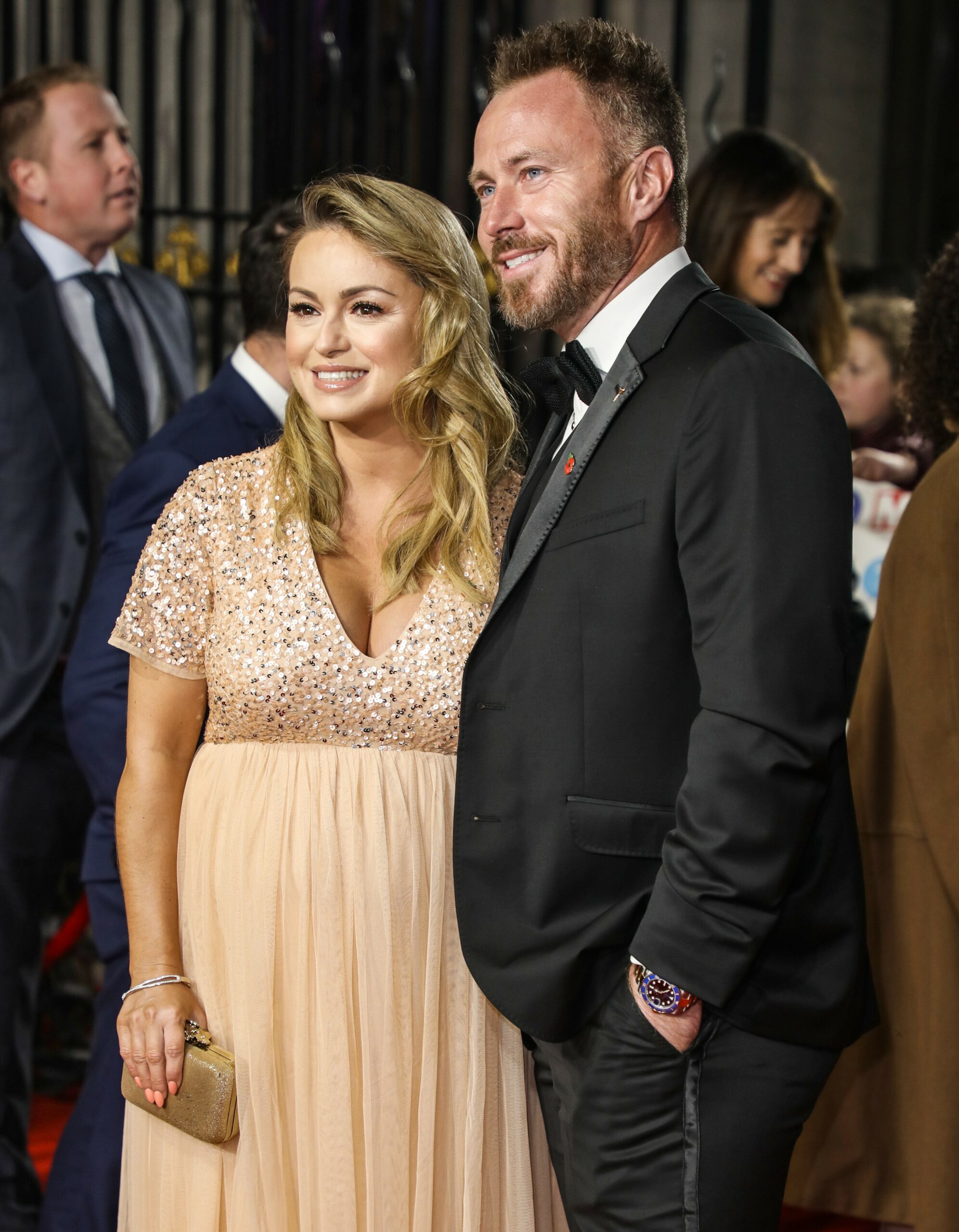 Ola and James Jordan smiling at Pride of Britain Awards