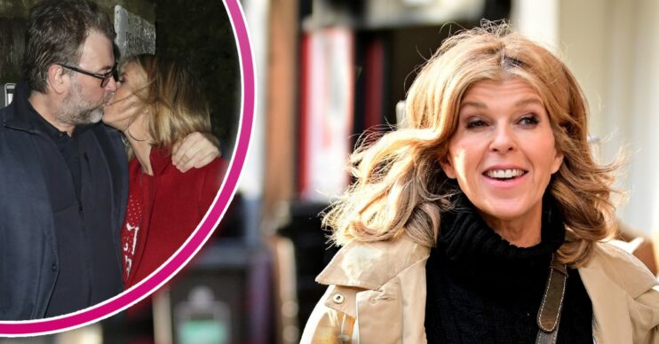 Kate Garraway smiling and kissing husband Derek