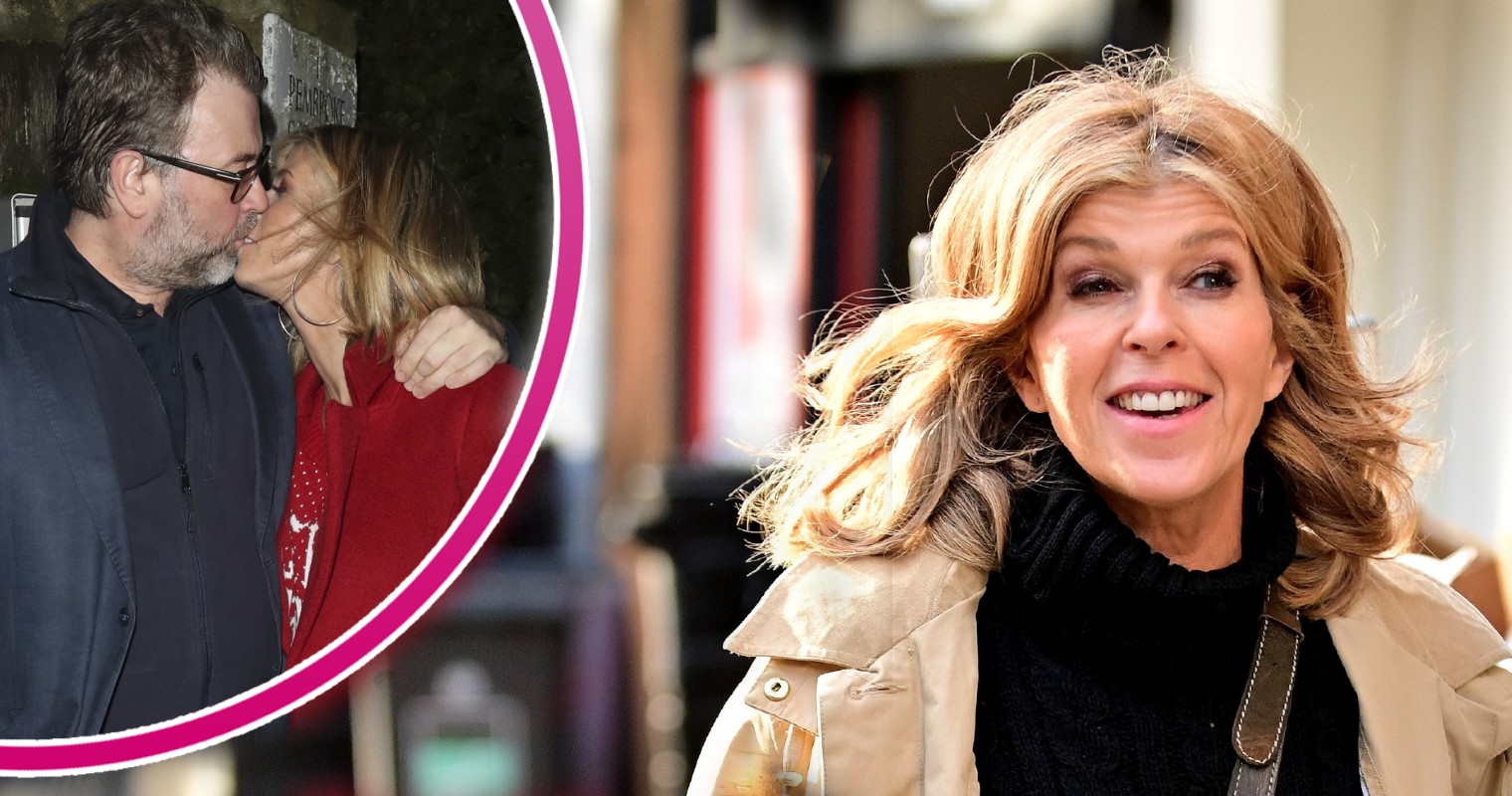Kate Garraway smiling and kissing husband Derek