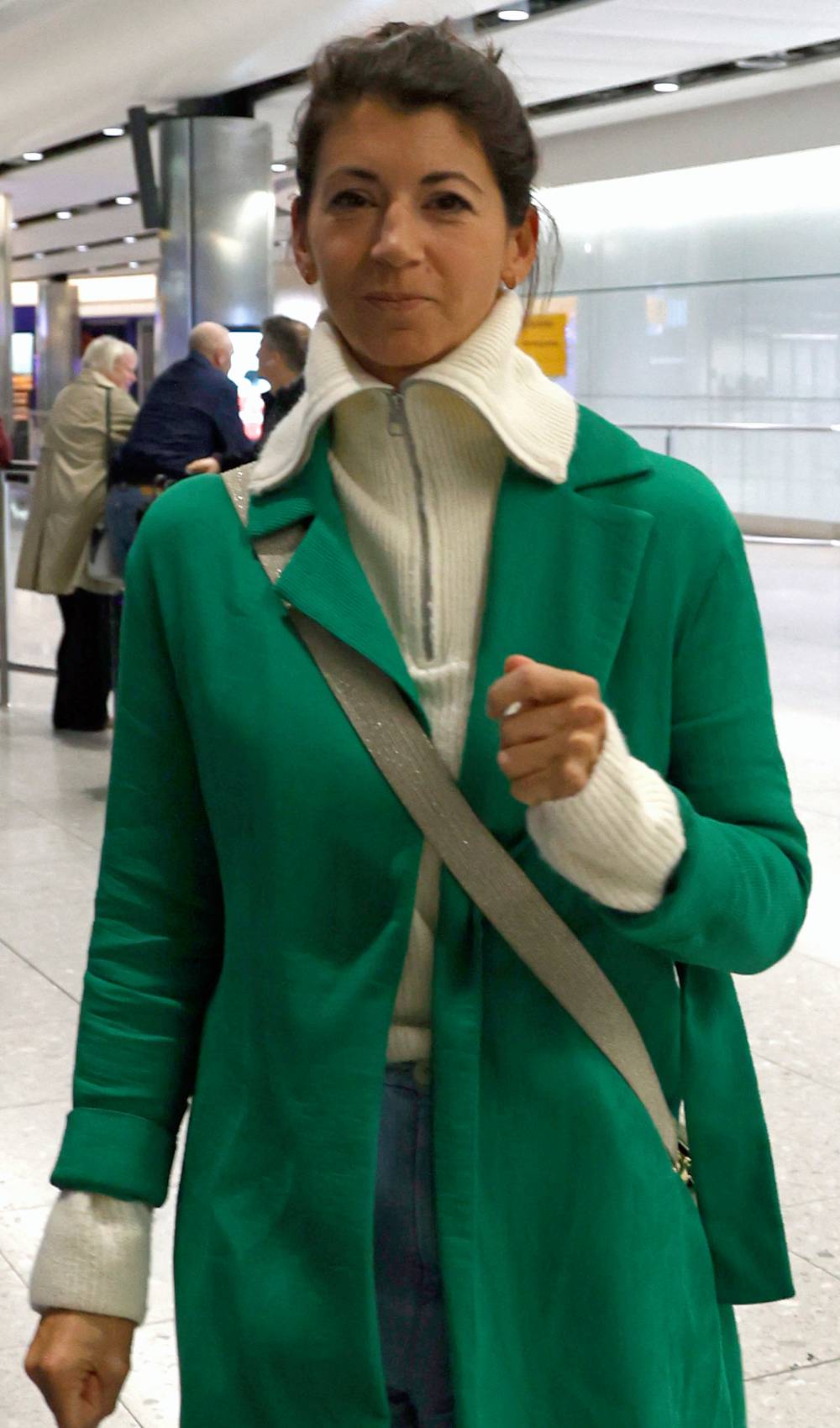 Matt Hancock's girlfriend Gina Coladangelo arrives back in the UK