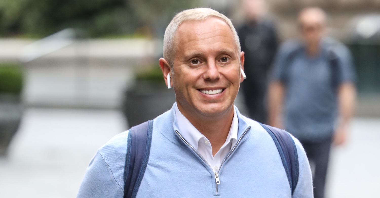 Rob Rinder smiling 