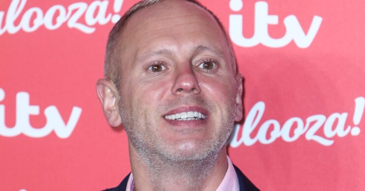 Rob Rinder smiling