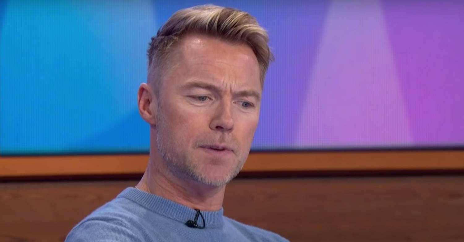 Ronan Keating looks down