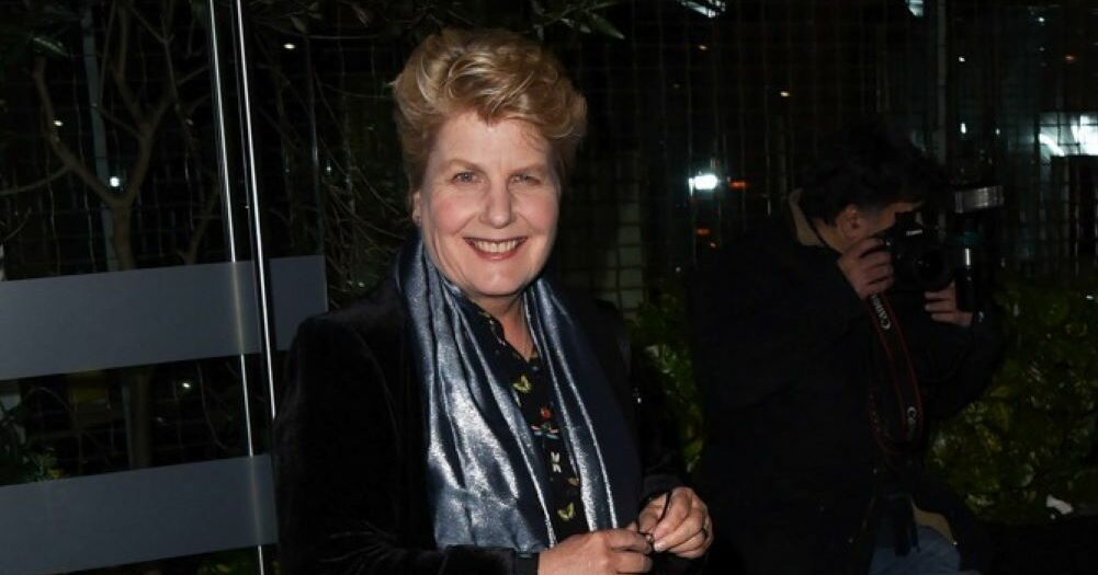 Sandi Toksvig smiles as she leaves awards