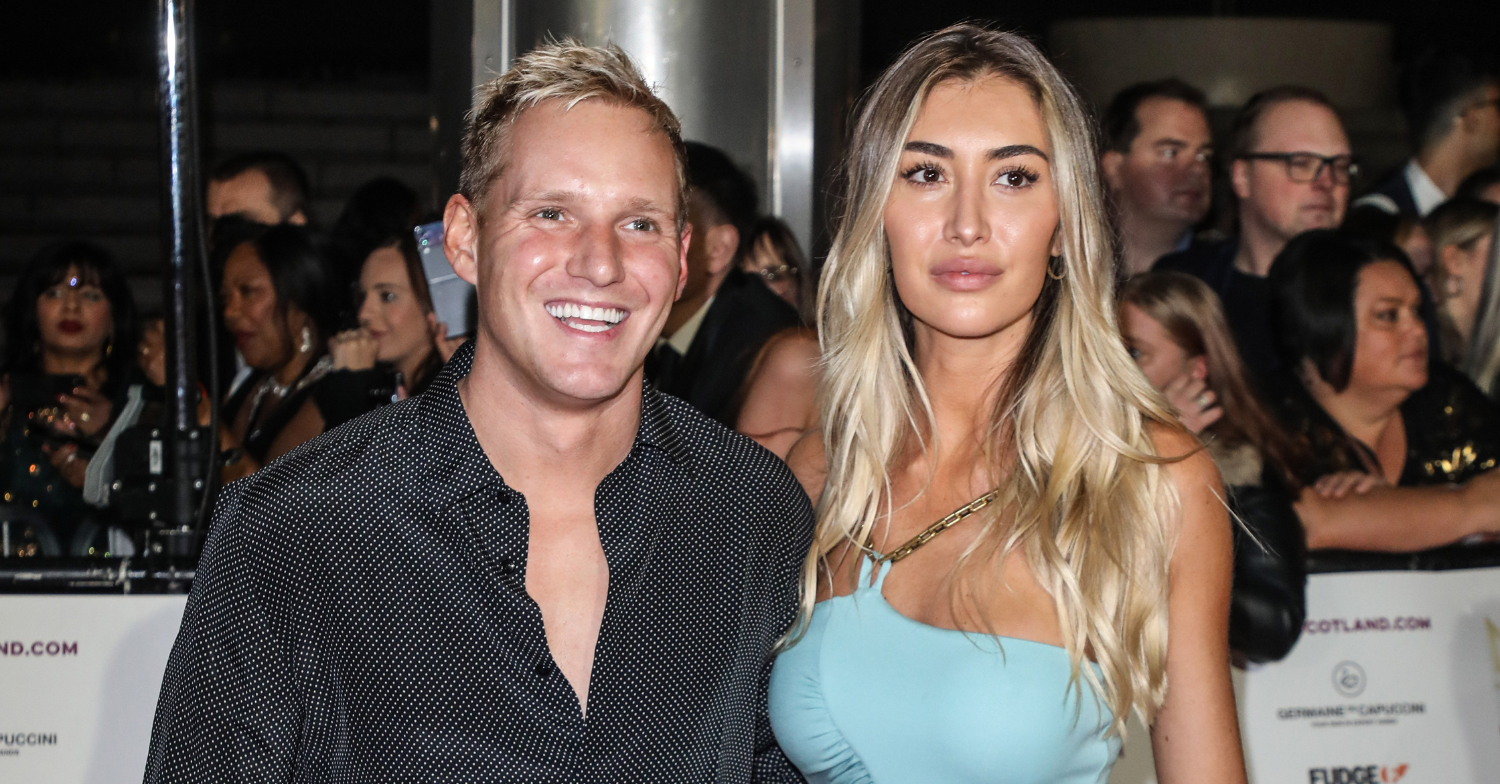 Jamie Laing and Sophie Habboo pose for photos at NTAs