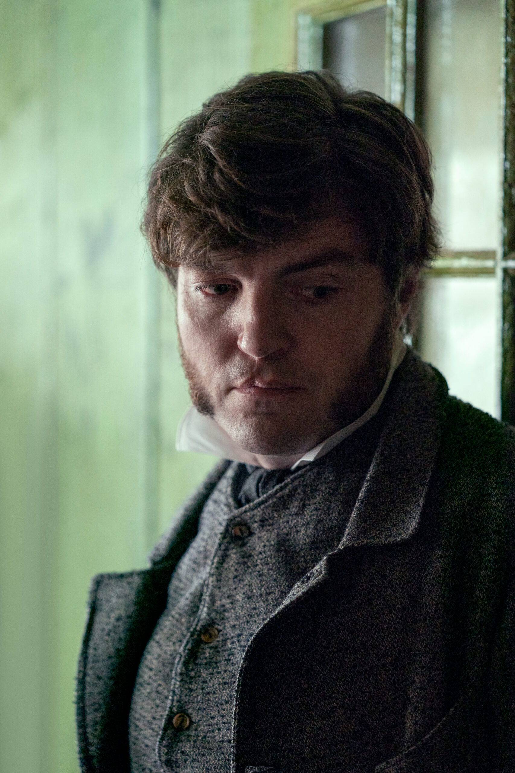 Will Byrne looks down in The Wonder