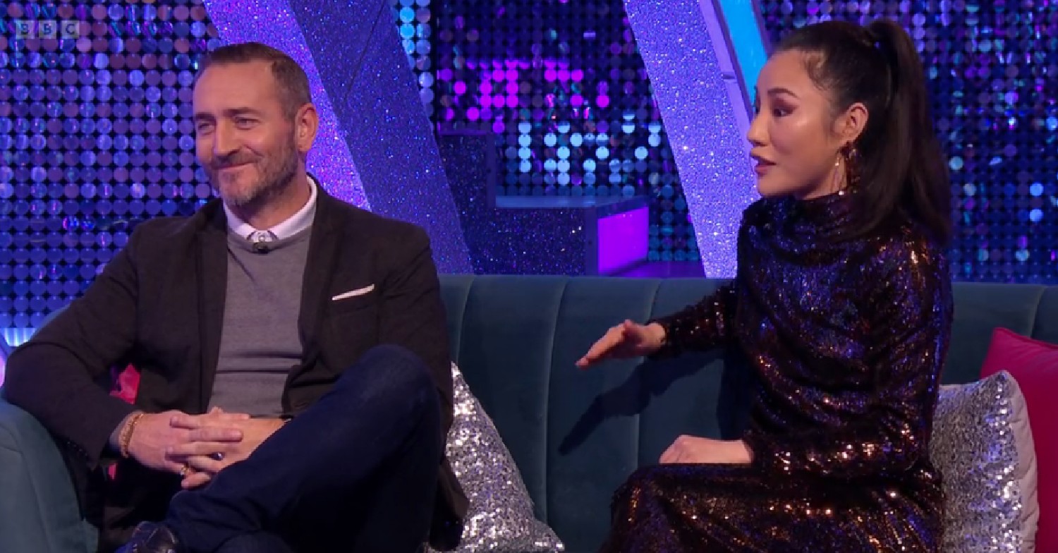 Will Mellor smiling as Nancy Xu talks on Strictly It Takes Two