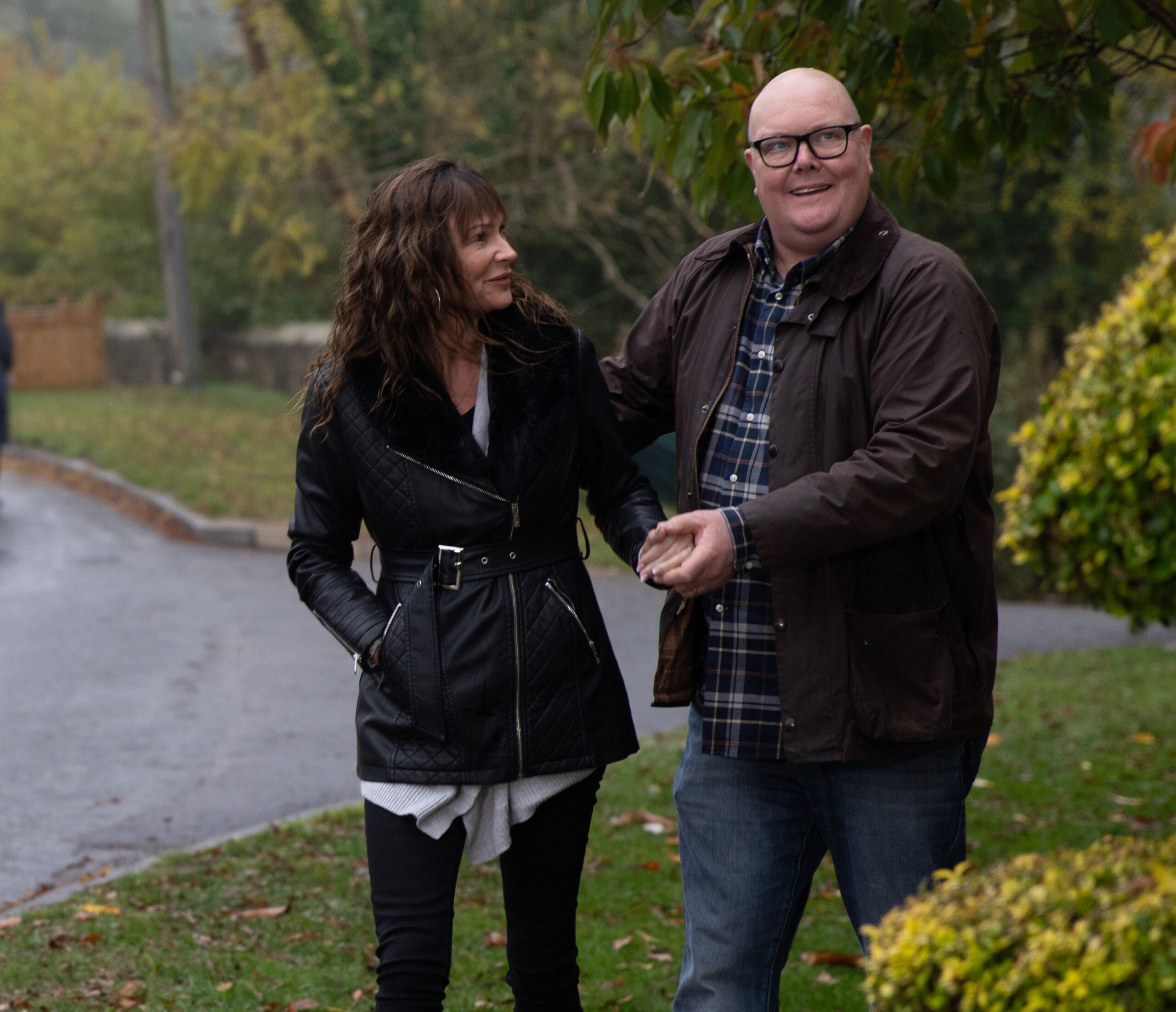 Paddy and Chas, hand in hand smiling on Emmerdale