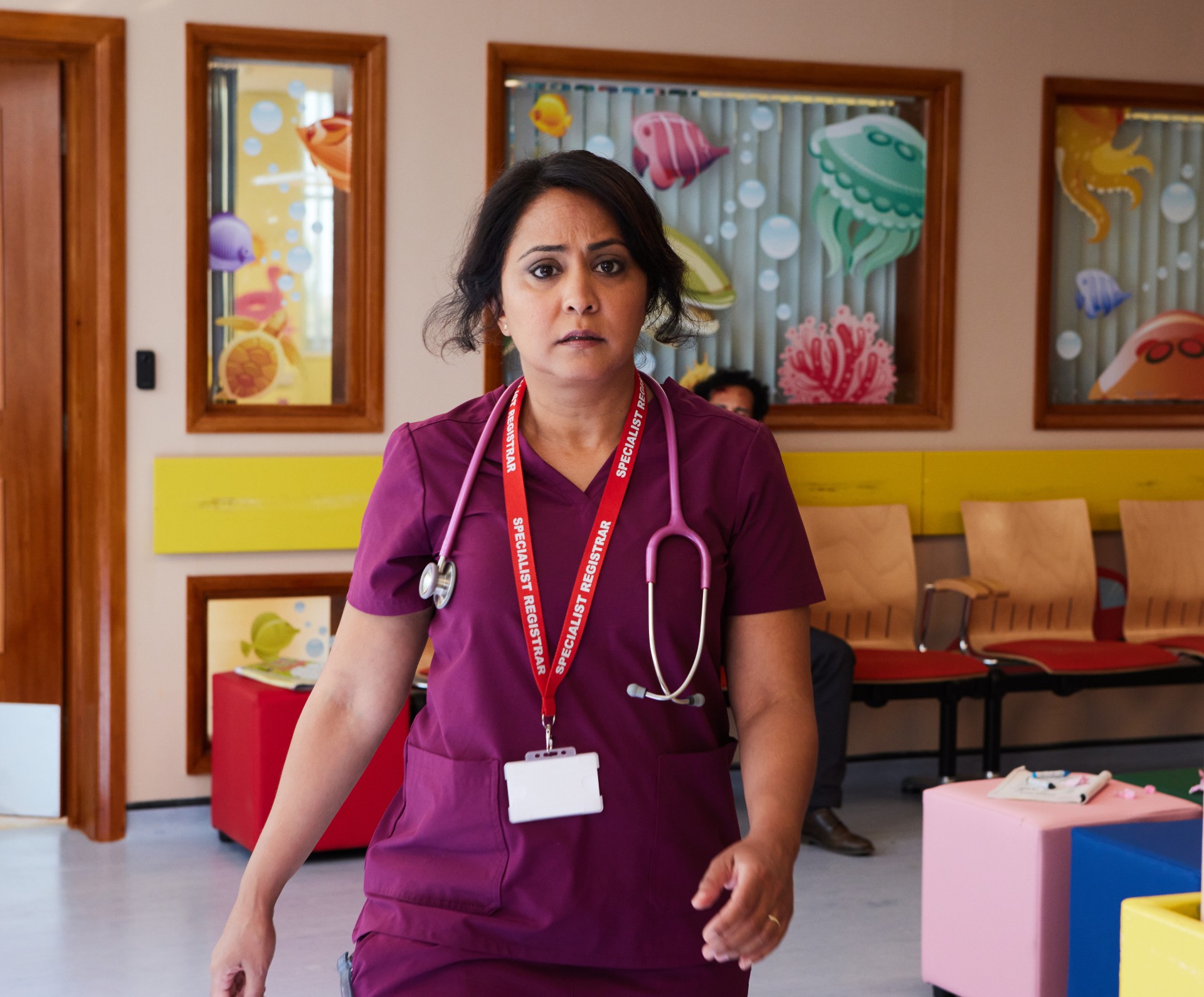 Maryam walks through the childrens ward in Maternal