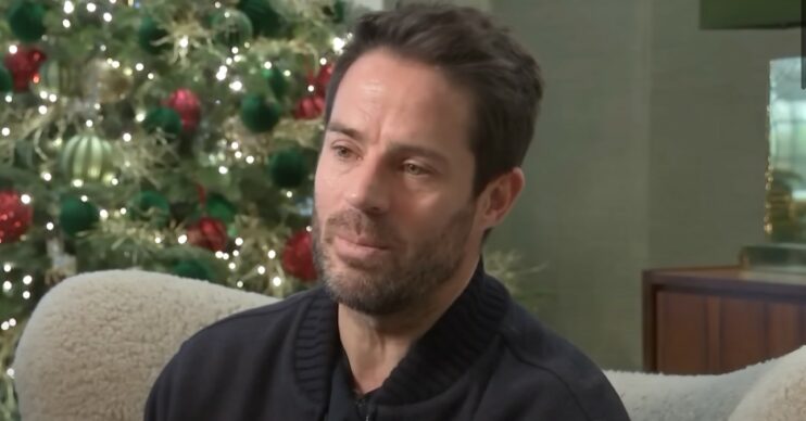 Jamie Redknapp in front of a christmas tree speaking