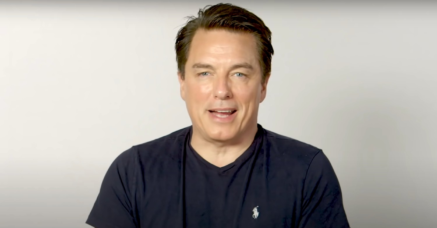 John Barrowman speaking to camera 