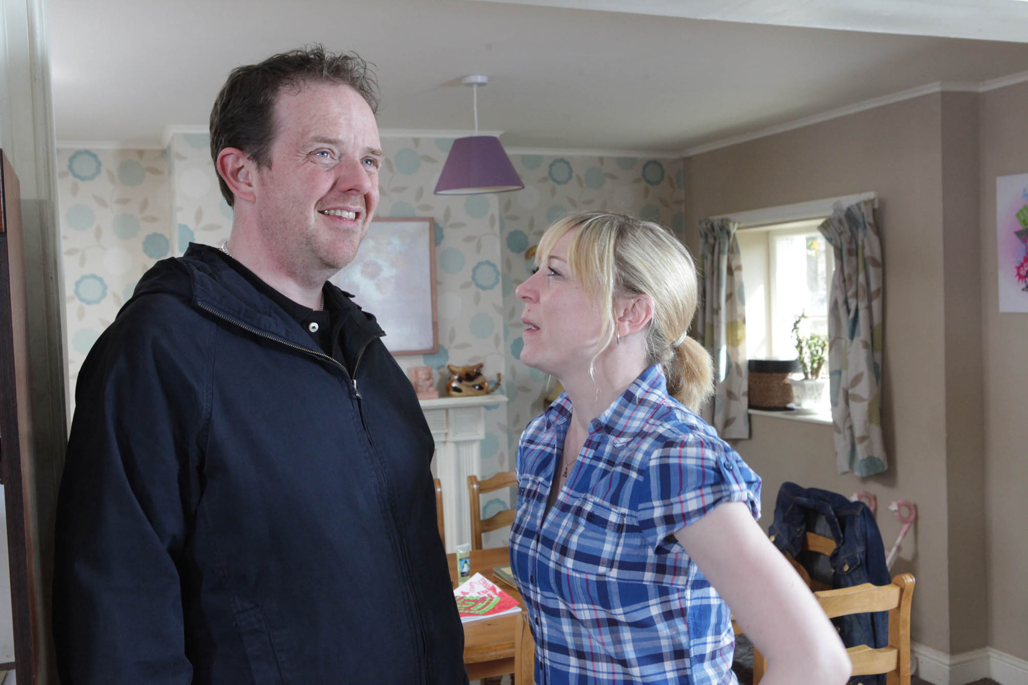 Dan looks amused as he winds up his ex-wife Ali by flirting with her in Emmerdale