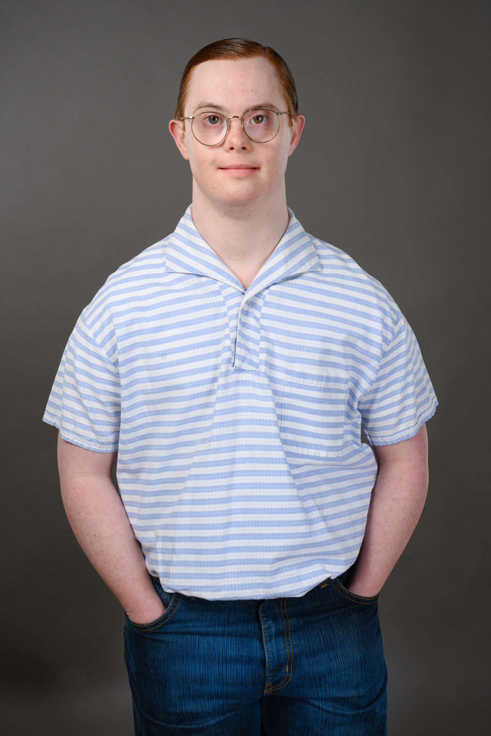 Daniel Laurie wearing a blue striped shirt in Call the Midwife