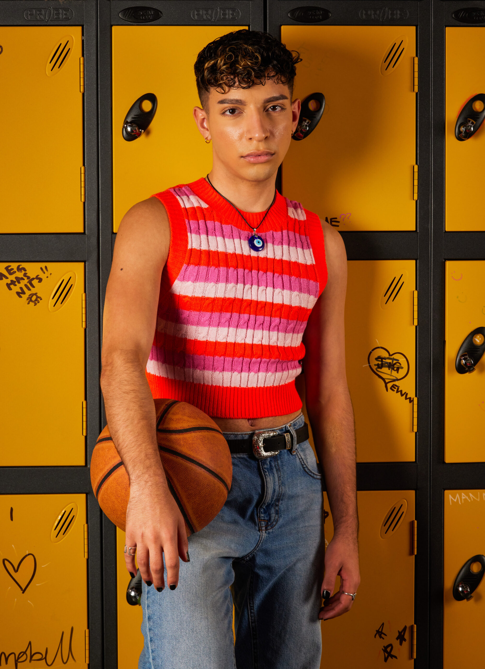 Kai holds a basketball in Waterloo Road