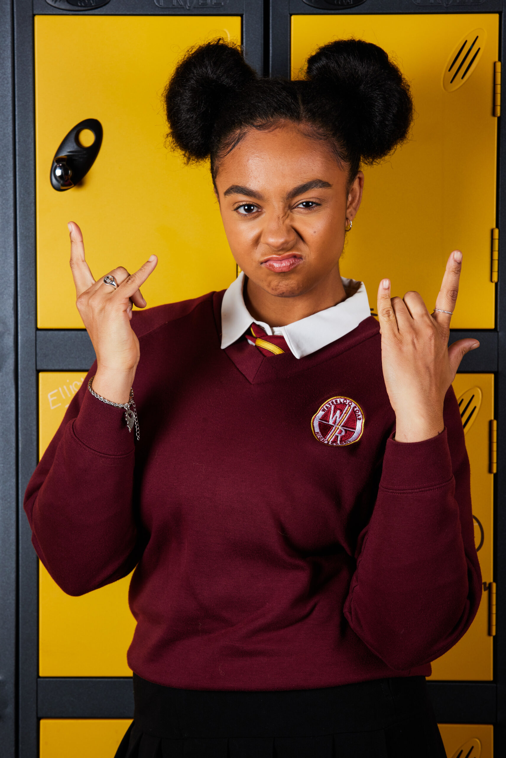 Kelly Jo poses next to her locker