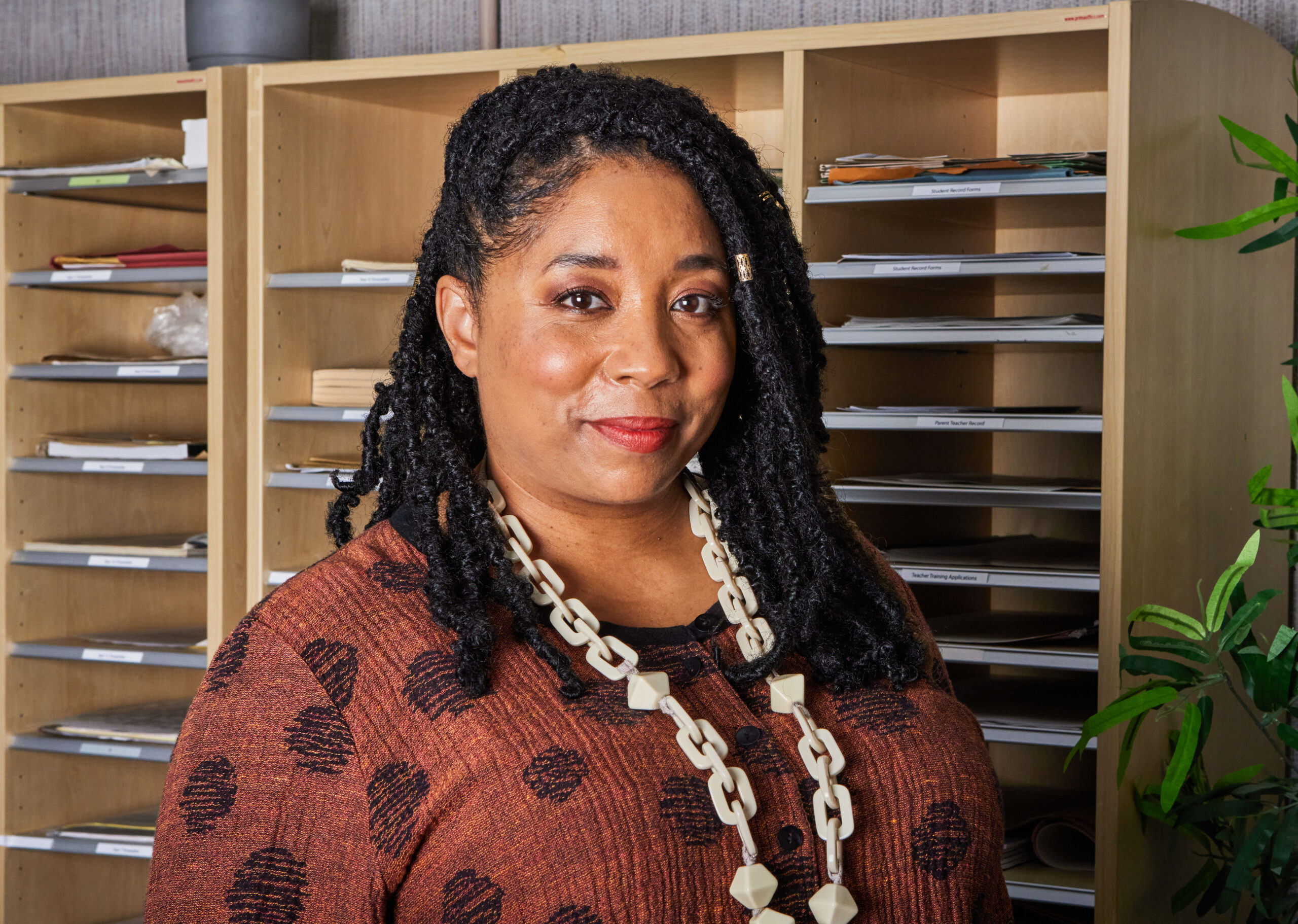Valerine Chambers stands in the staff room in Waterloo Road