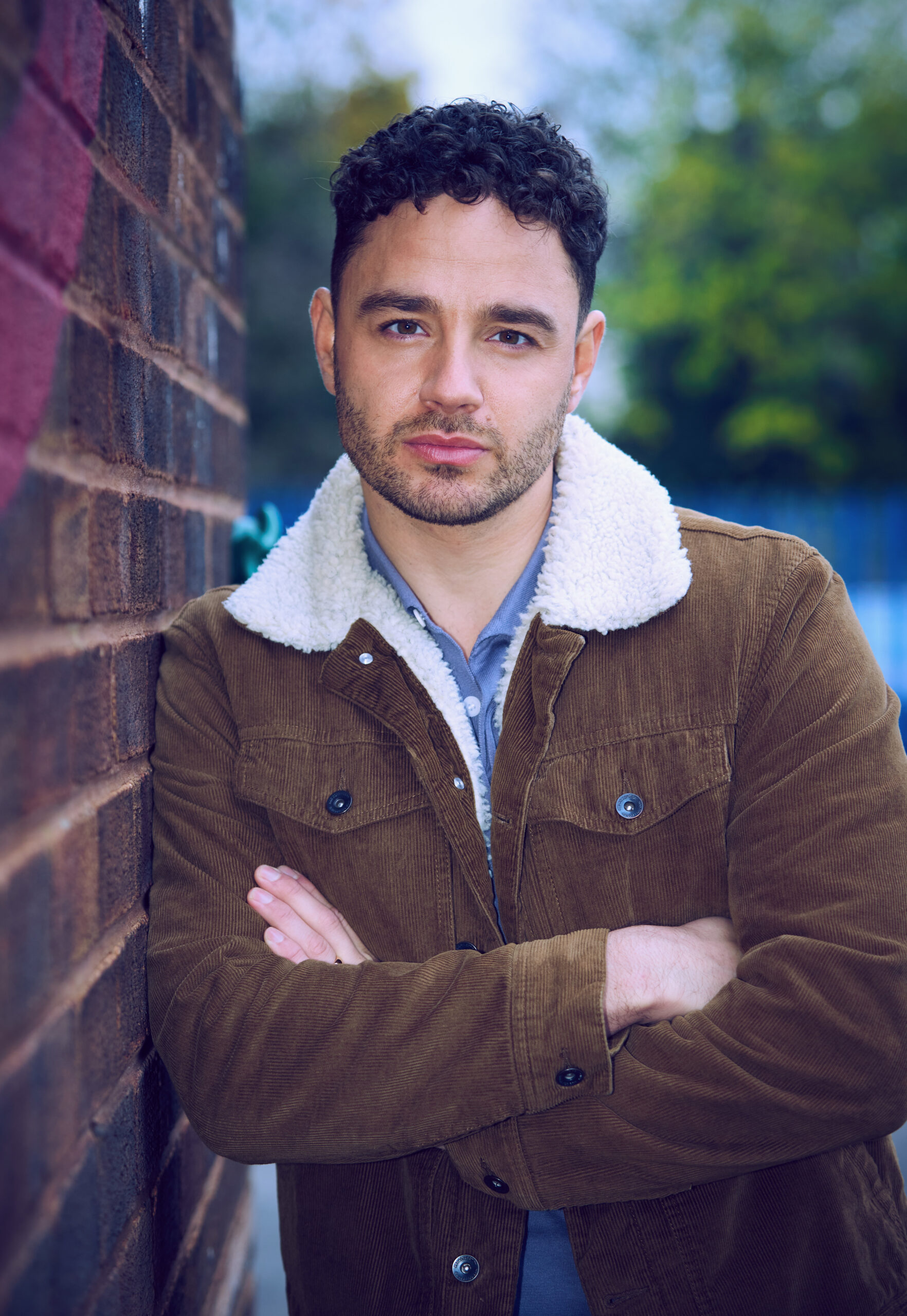 Donte Charles leans against a wall in Waterloo Road