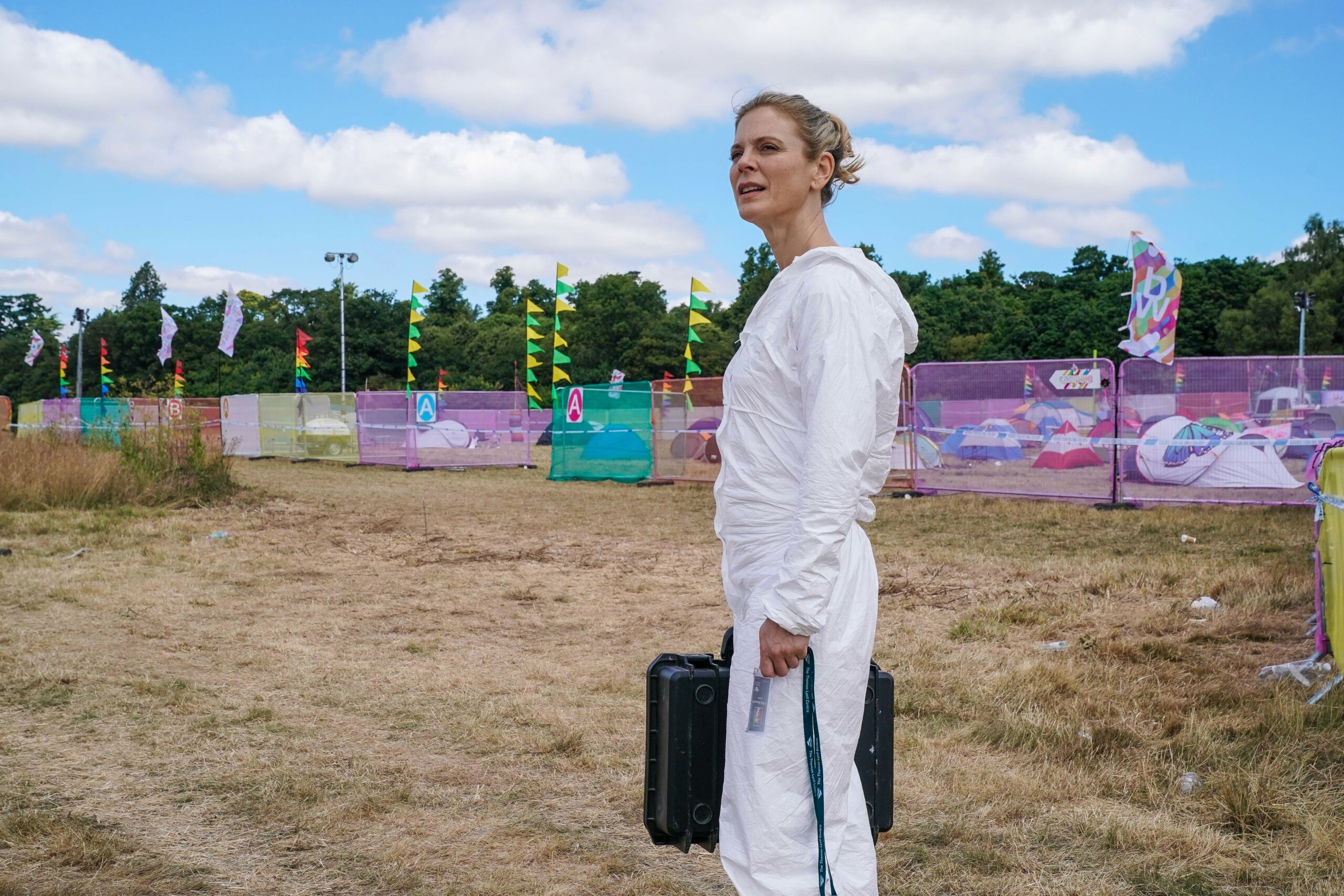 Nikki frowns at the festival in Silent Witness