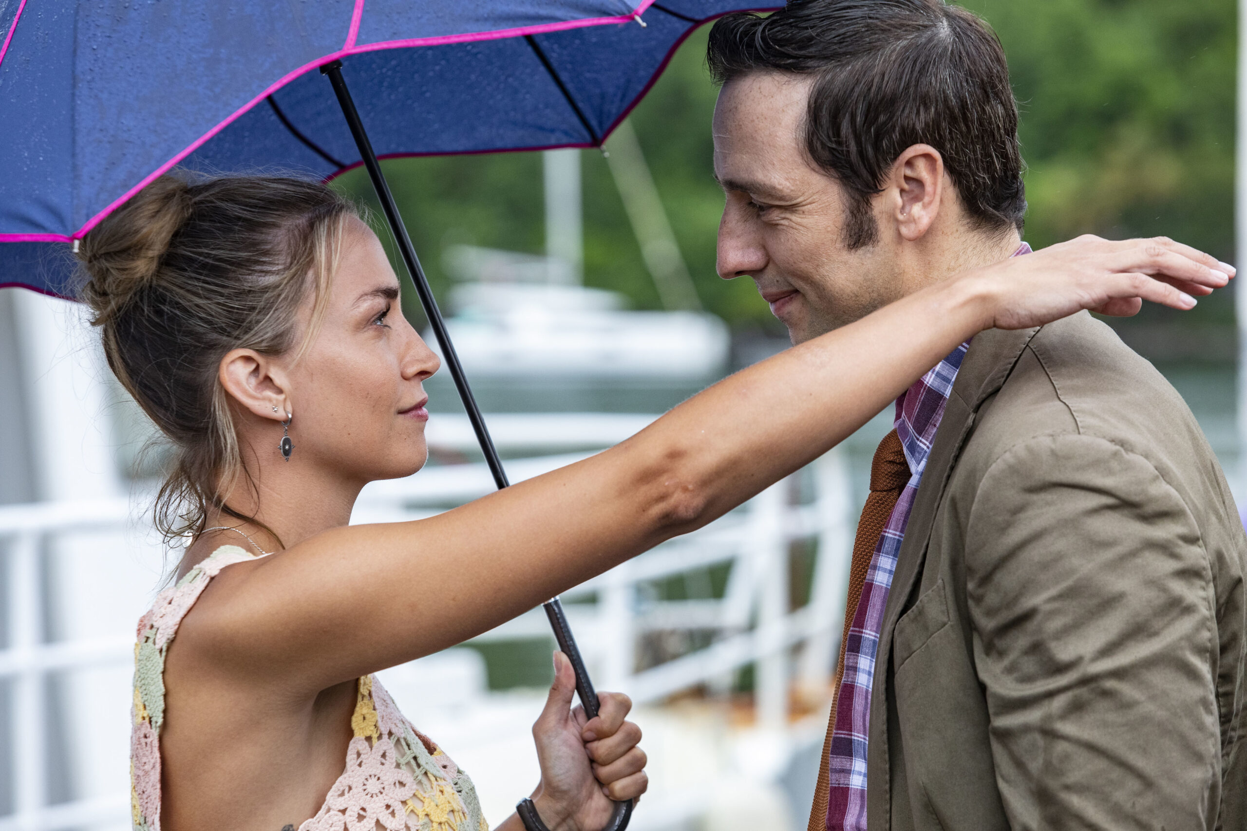 Sophie and Neville stare into each other's eyes in Death in Paradise