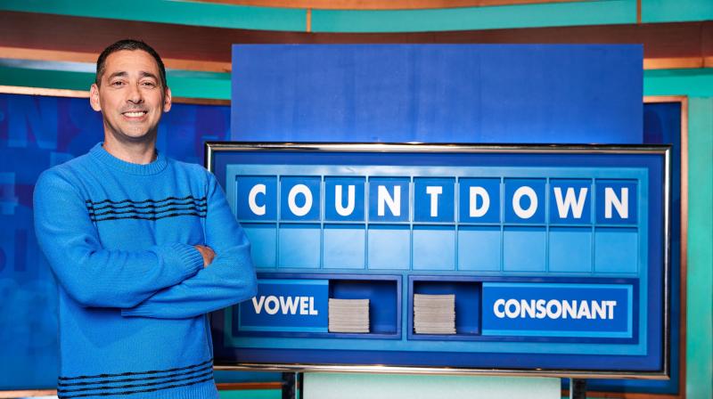 Countdown new host Colin Murray smiles next to letters