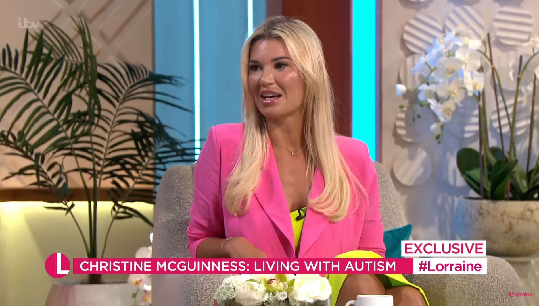 Christine McGuinness smiles in pink jacket during Lorraine interview