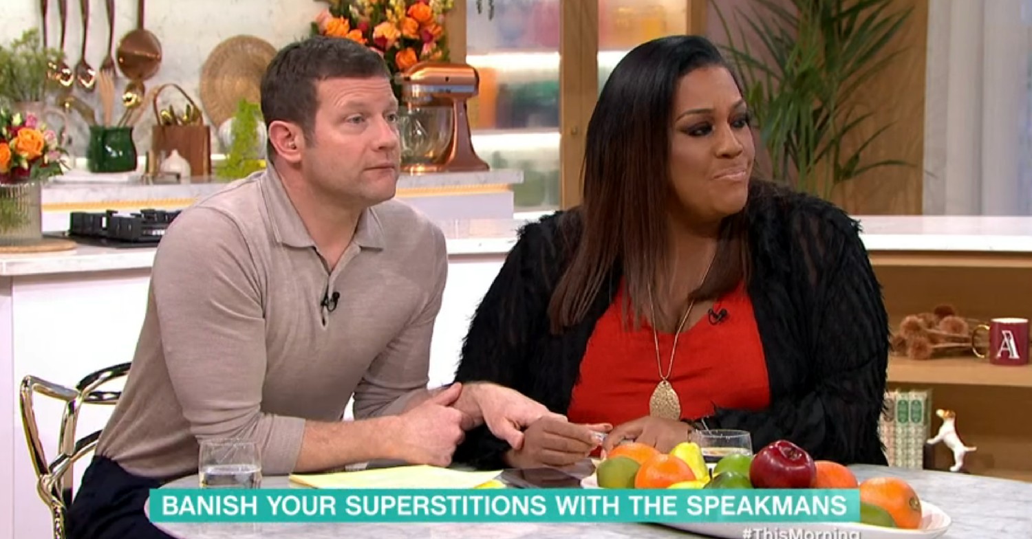 Dermot holding Alison's arm on This Morning today 