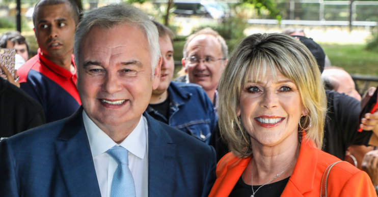 Ruth Langsford and Eamonn Holmes smiling on the red carpet