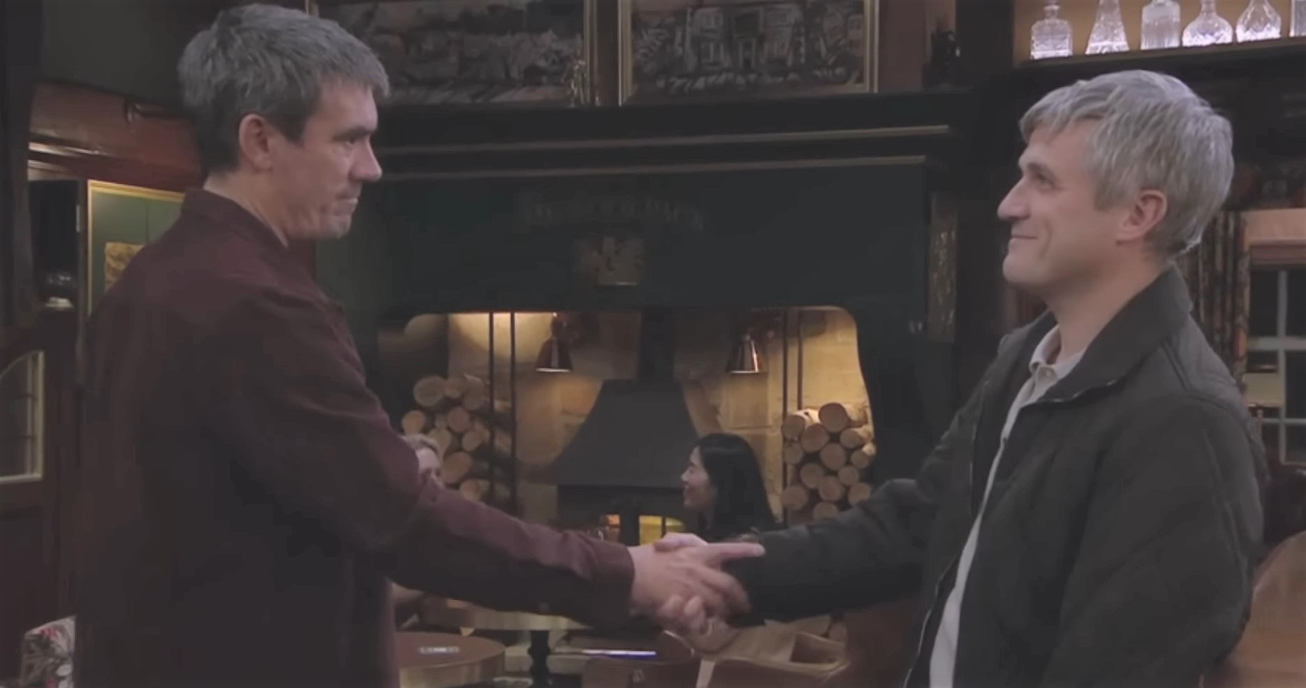 Emmerdale: Cain and Caleb shake hands and force a smile