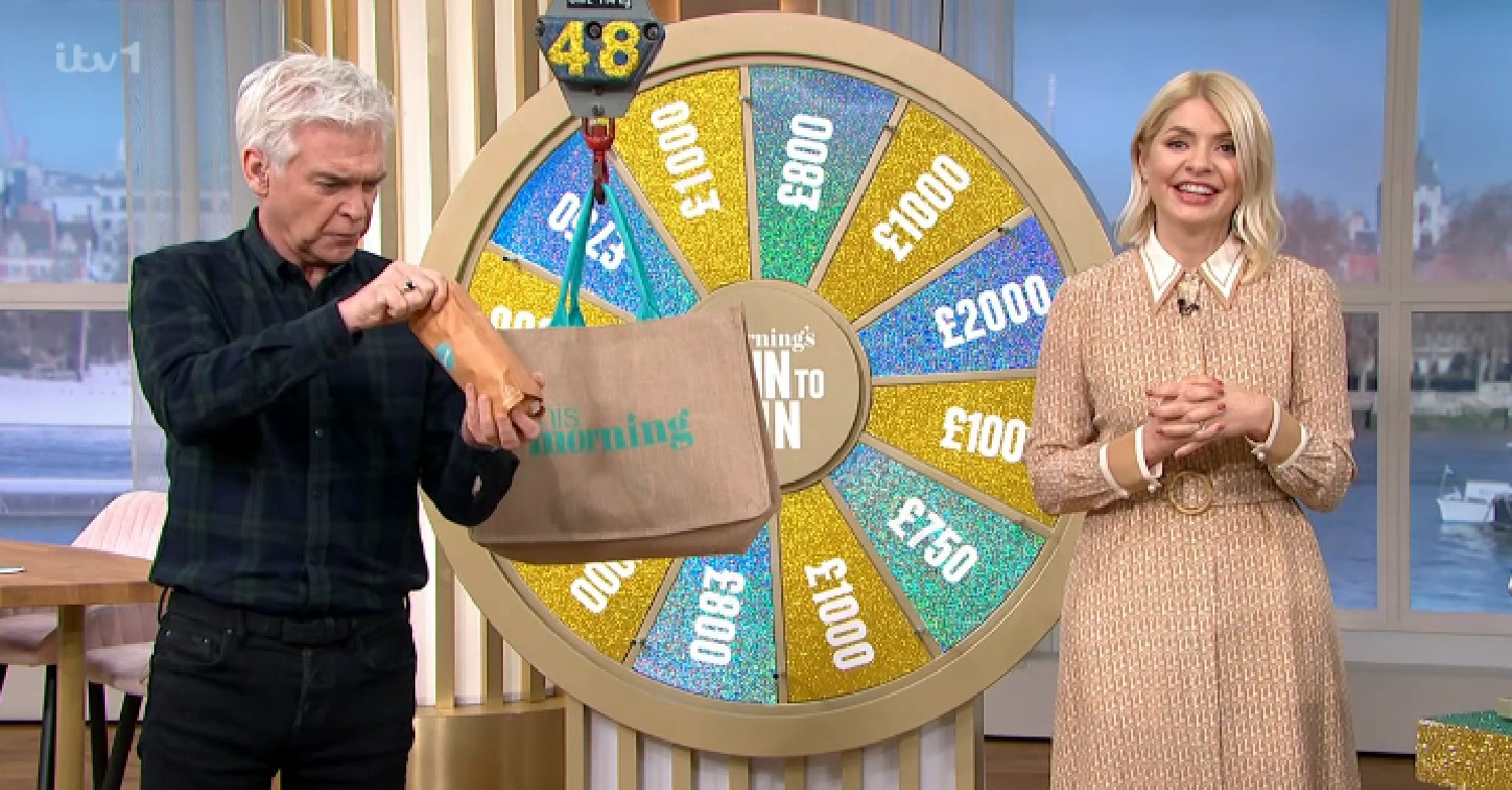Phillip Schofield and Holly Willoughby, in patterned dress, on This Morning today