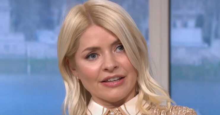 Holly Willoughby looking scared in tan dress on This Morning today