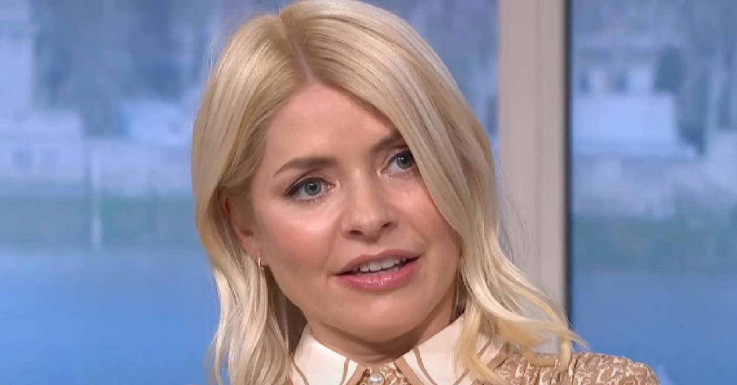Holly Willoughby looking scared in tan dress on This Morning today