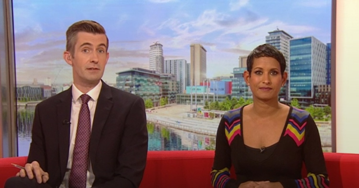 Ben Thompson and Naga Munchetty, in pattern dress, hosting BBC Breakfast today