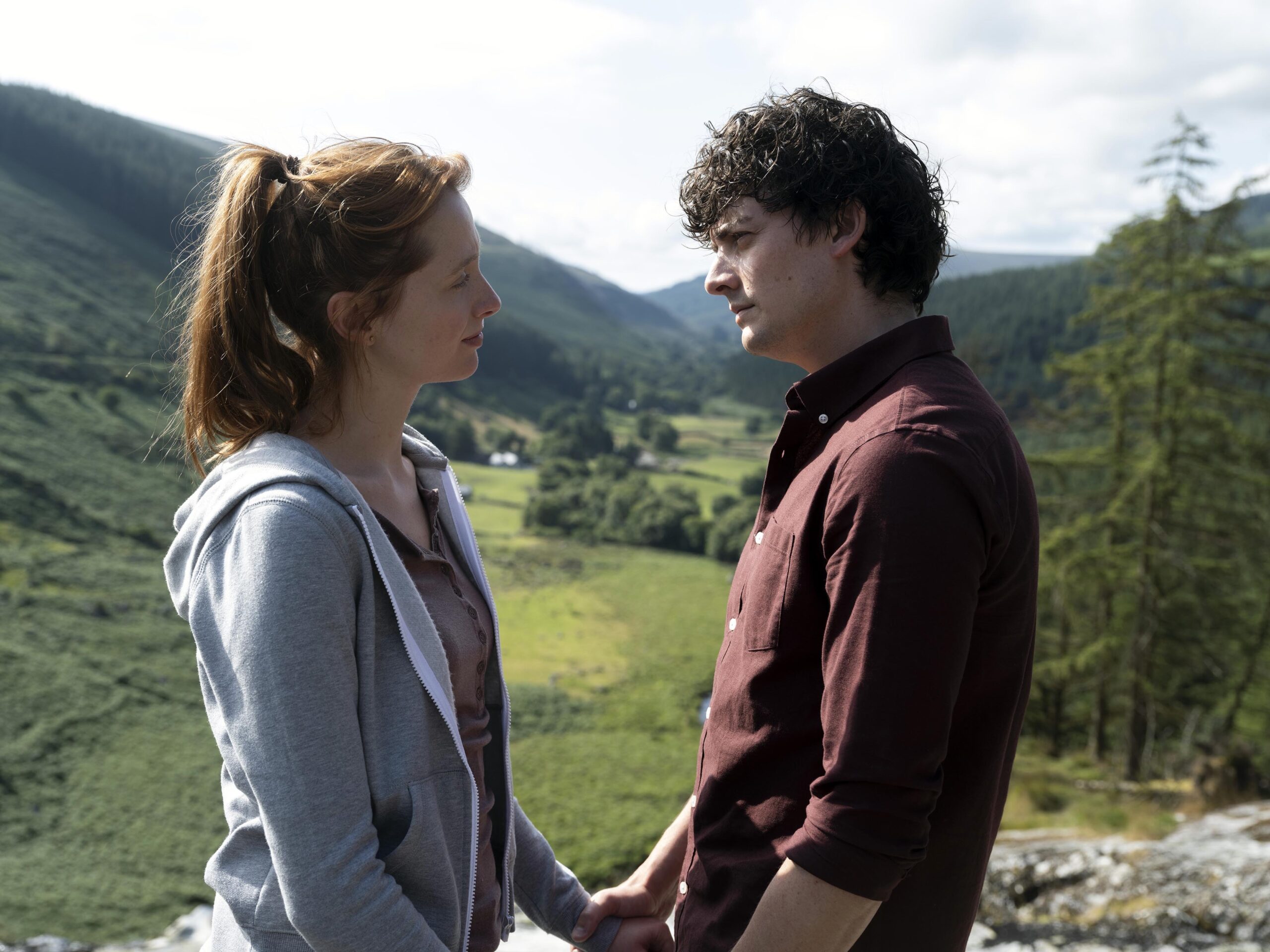 Ryan and Abbie holding hands in The Catch