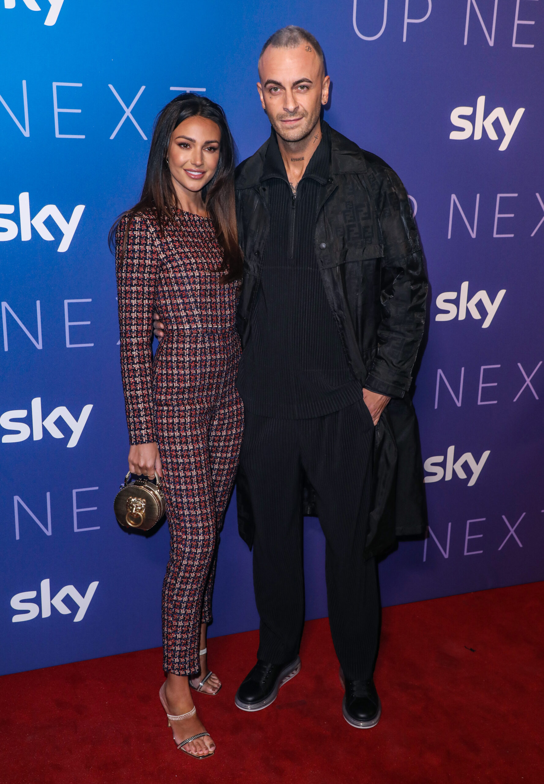 Michelle Keegan and Joe Gilgun smiling togethet