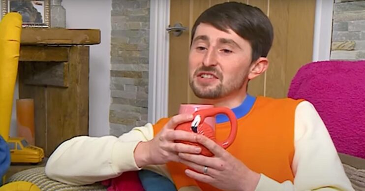 Pete Sandiford shares baby news, holds a cup