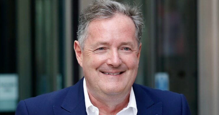 Piers Morgan smiles outside BBC studios