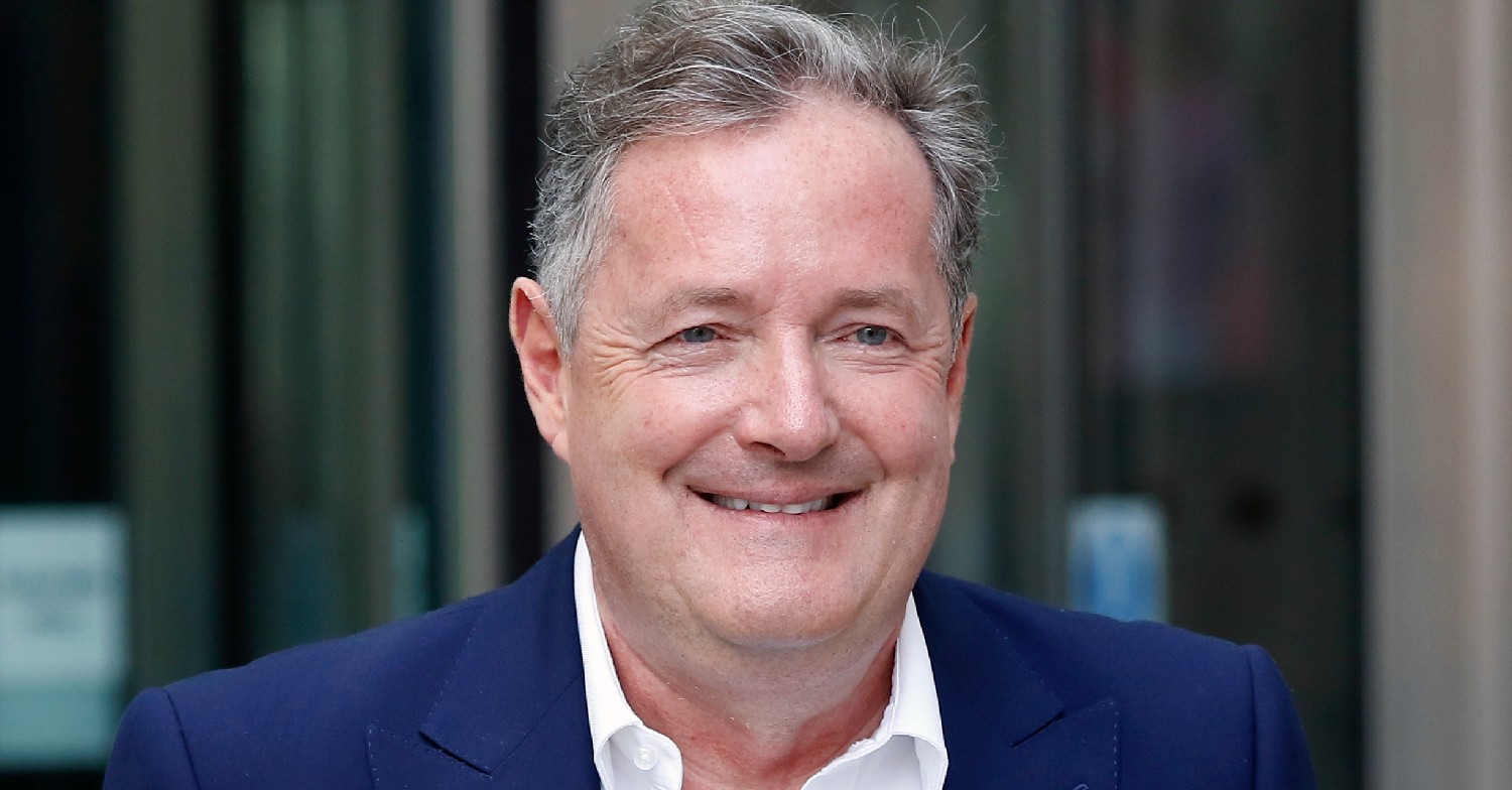 Piers Morgan smiles outside BBC studios