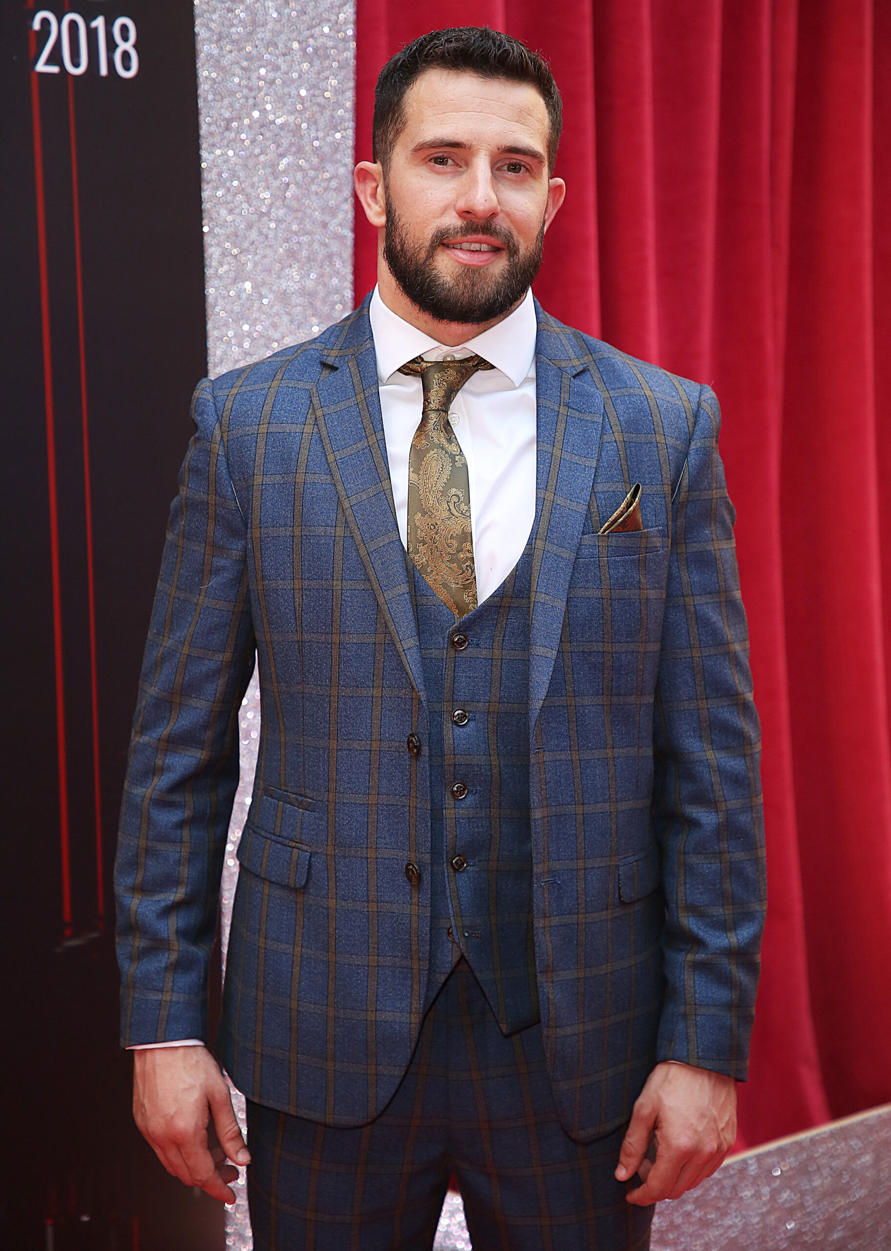 Mike Parr posing on the red carpet