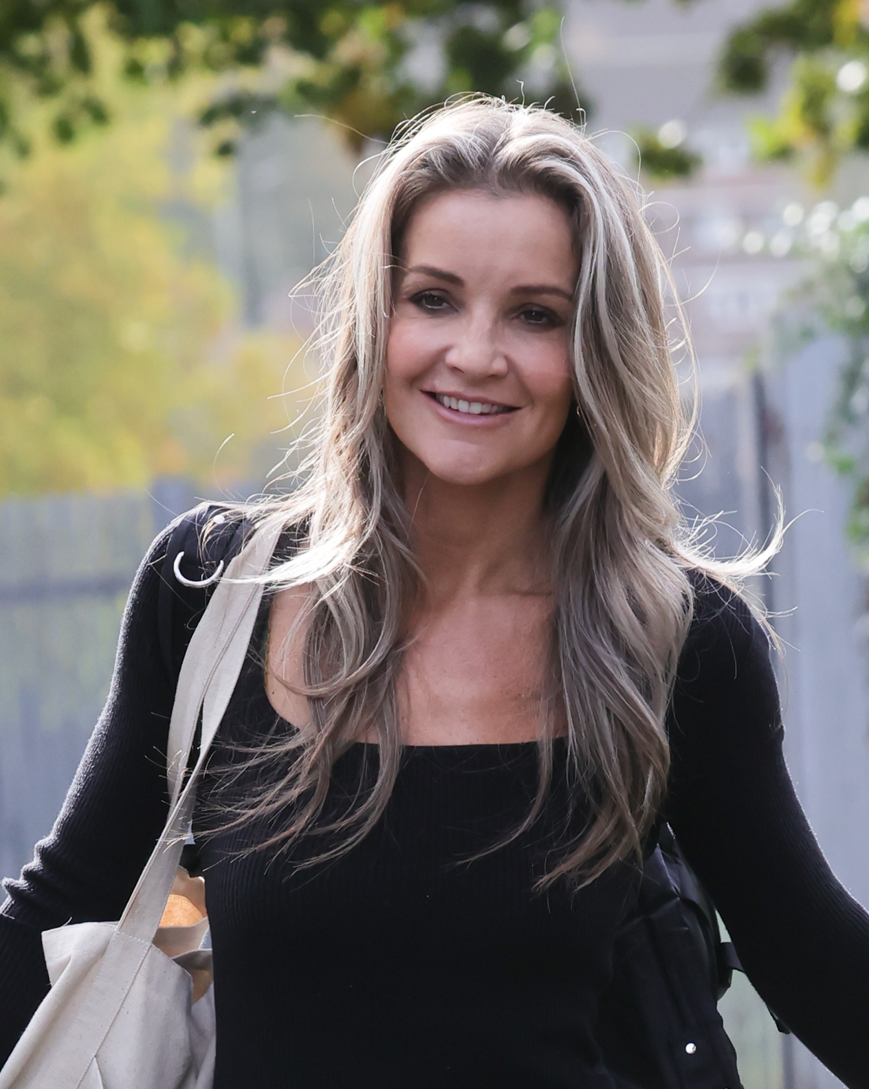 Helen Skelton smiling in the street
