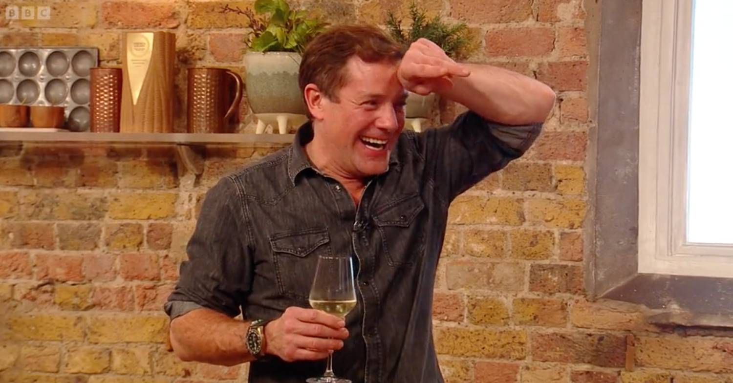 Saturday Kitchen host Matt Tebbutt holds a glass of wine on the show today