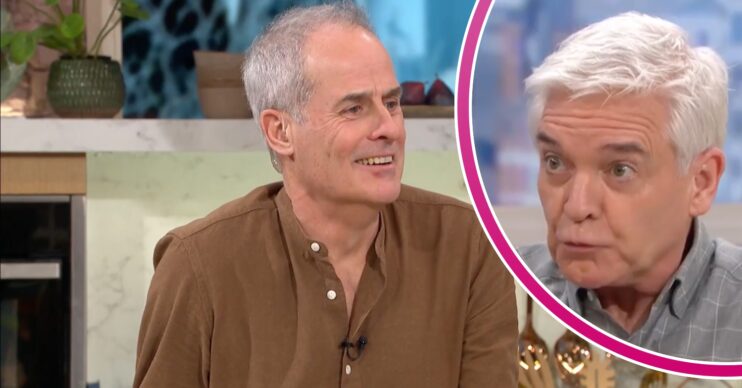 Phil Vickery smiling and Phillip Schofield looking shocked in This Morning