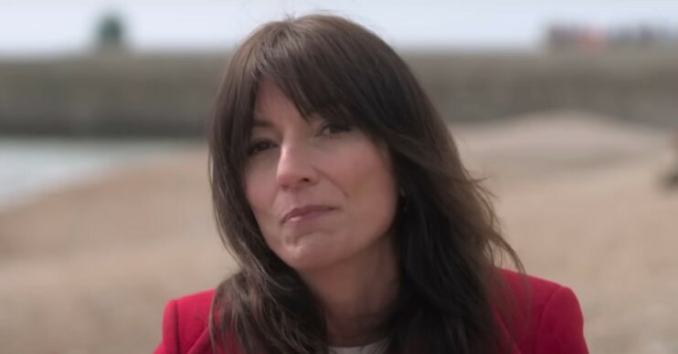 Davina McCall on a beach