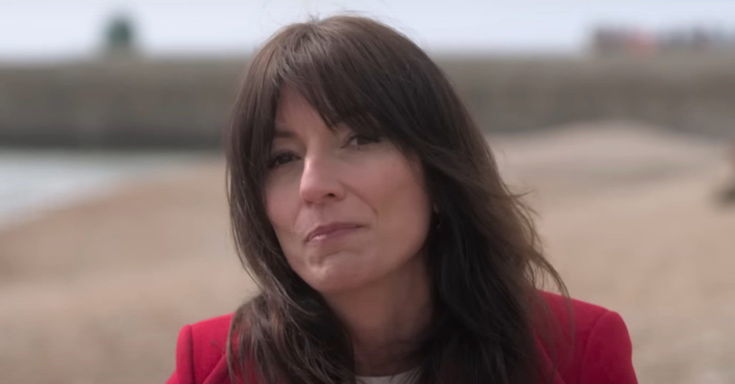 Davina McCall on a beach