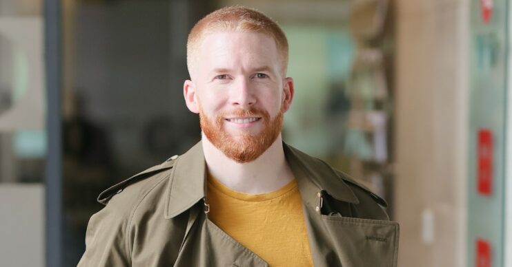 Strictly star Neil Jones smiling outside TV studios