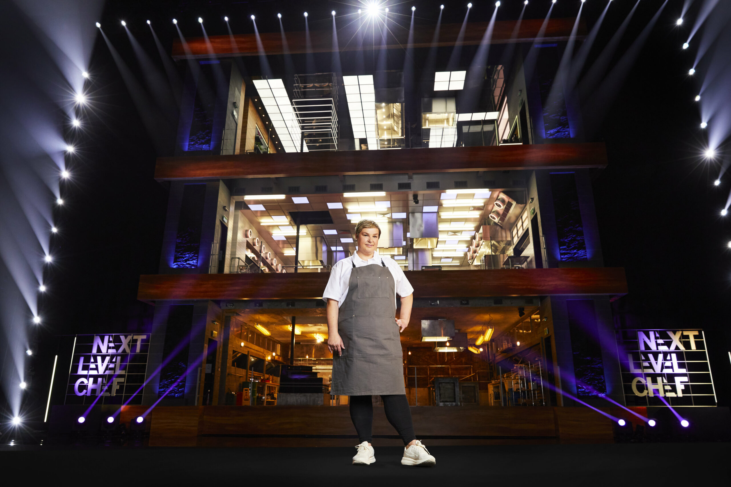 Kelly Hunter smiles in the Next Level Chef kitchen
